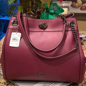 Coach dark berry turnlock purse
